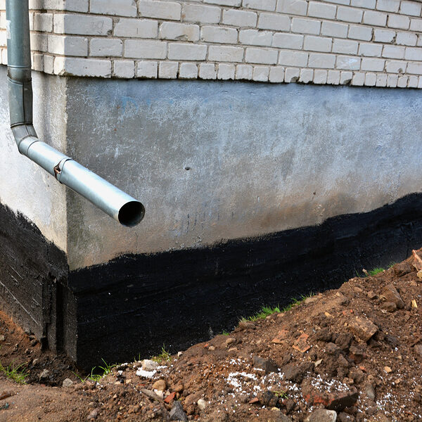 waterproofing city flat house foundation with bitumen